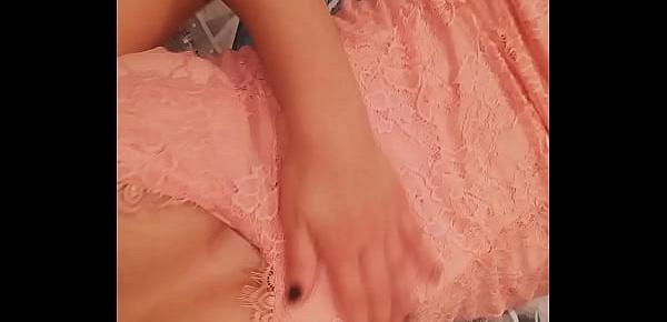  Gently and passionately masturbating in a pink dress